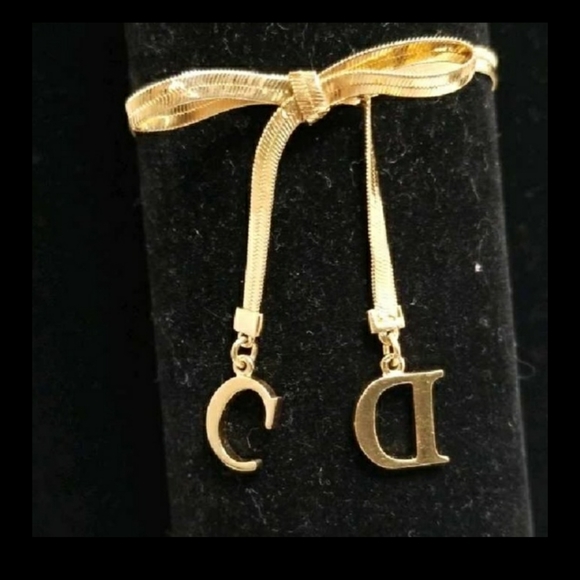 CHRISTIAN DIOR VINTAGE KNOT BRACELET - Picture 1 of 4